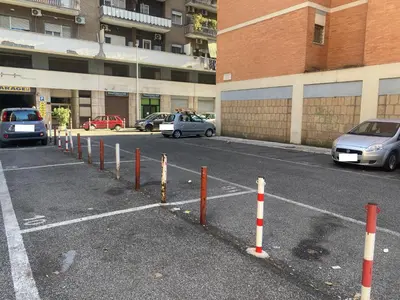 a bed with a purple object sitting on top of it at Michele Lux Lodge 6 people Spotless and Connected to Airport and Vatican in Rome