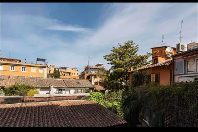 a view of a city with buildings in the background at Home trastevere in Rome
