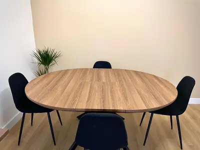 a wooden table with chairs in a room at LH Vatican Museum Wi-Fi AC Flat Premium Comfort in Rome