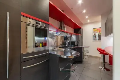 a kitchen with a sink and a counter top at Leone IV - WelcomeToRhome in Rome