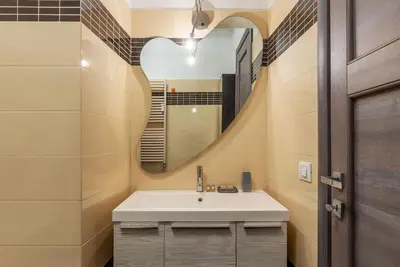a bathroom with a sink and a mirror at Leone IV - WelcomeToRhome in Rome