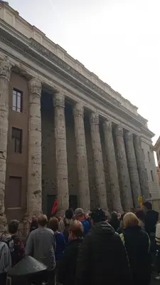 a crowd of people standing in front of a building at Loft Lomelina, Roma, Metro Bologna Colosseo in Rome