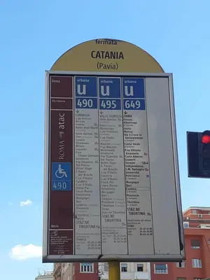 a sign on a street with a traffic light at Loft Lomelina, Roma, Metro Bologna Colosseo in Rome
