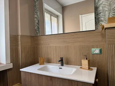 a bathroom with a sink and a mirror at Gloria Mundi in Rome