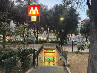 a mcdonalds sign in a park with a pool at Domus Albalonga in Rome