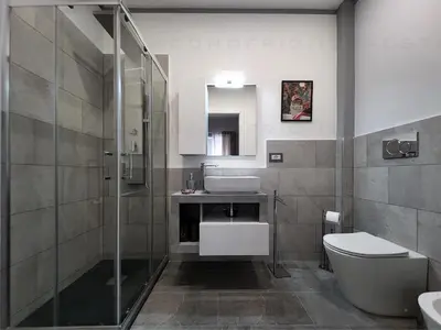 a bathroom with a toilet and a sink and a shower at Patrica house in Rome