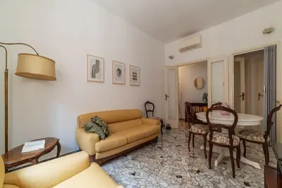 a living room with a couch and a table at Casa Luisa - WelcomeToRhome in Rome