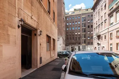 a car parked on a street next to a building at Casa Luisa - WelcomeToRhome in Rome