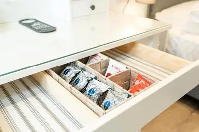 a drawer in a refrigerator filled with drinks at Salotto Tuscolano in Rome