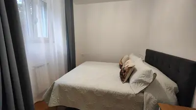 a mirror on a wall with a bed in it at Residence Il Vittoriano in Rome