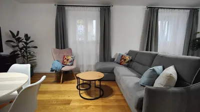 a living room with a table and a couch at Residence Il Vittoriano in Rome
