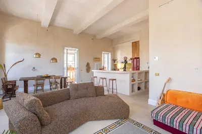 a living room with a couch and a table at Labicasa in Rome