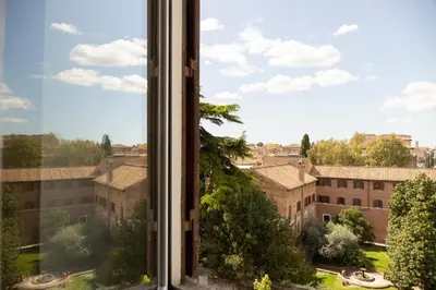 a window with a view of a city at Labicasa in Rome