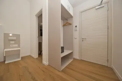 a hallway with a sliding door in a room at LH Hotel Andreotti in Rome