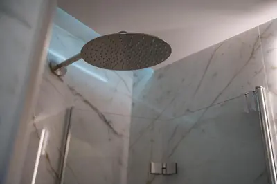 a shower with a shower head in a bathroom at Luxury Apartment - Vatican Area - Key Collection in Rome