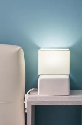 a white printer sitting on top of a table at Roma Design Rooms San Giovanni Colosseo Area in Rome