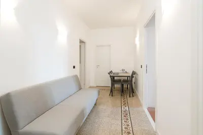 a living room with a couch and a table at Vista Laterana in Rome