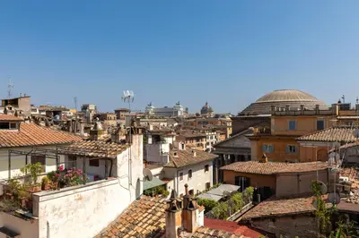 a view of the roofs of a city at Celeste Retreat al Pantheon - Homkeey Apartments in Rome
