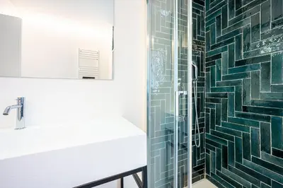 a bathroom with a shower and a sink at Domus Piramide in Rome