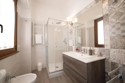 a bathroom with a shower and a sink and a toilet at VaticanRhome II in Rome