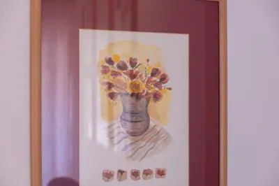a painting of a vase with flowers in it at Elegantis Josephine Suite - Elegance near Spanish Steps Trevi and Pantheon in Rome