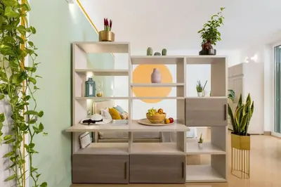 a shelf with fruits and vegetables on it in a room at Secret Garden Apt Colosseo - Homkeey Apartments in Rome