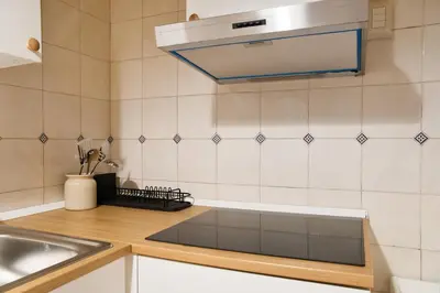 a kitchen with a sink and a counter top at Little Dome - San Pietro in Rome