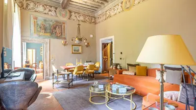 a living room with a couch and a table at La Casa d'Argento in Rome