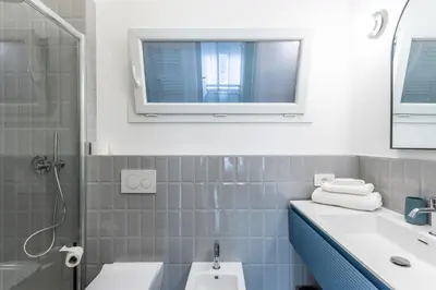 a bathroom with a sink and a mirror at Domus Veneranda in Rome