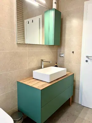 a bathroom with a white sink and a mirror at Oasi di pace in Rome