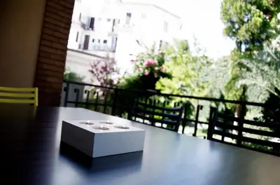 a white box sitting on top of a table at Dolcevita suite in Rome