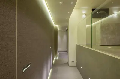 a hallway with a glass counter and a hallway with a hallway at Room 230 Roma Luxury Suites in Rome