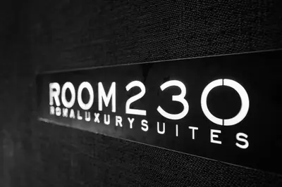 a sign that reads room buildingsitute at Room 230 Roma Luxury Suites in Rome