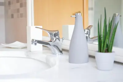 a bathroom counter with a sink and a faucet at Annmarie House, Vaticano - Cipro in Rome