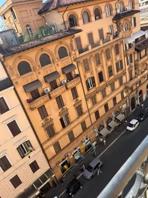 an overhead view of a building with cars parked on a street at TERMINI ROMA CENTRo in Rome
