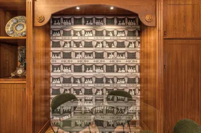 a glass door with a table in a dining room at Trevi Central Suite in Rome