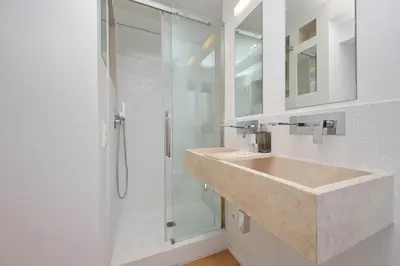 a bathroom with a sink and a shower at YCH-Splendido attico con terrazzo a San Giovanni in Rome