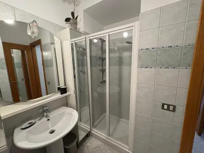 a bathroom with a shower and a sink at La Casa di Valentina in Rome