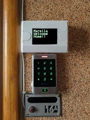 an electronic device is attached to a cork wall at Quiet, Cozy flat near citycenter in Rome