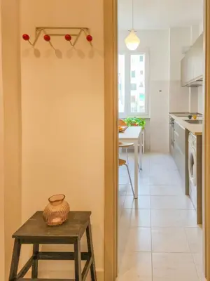 a kitchen and dining room with a table and a dining room at Quiet, Cozy flat near citycenter in Rome