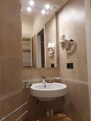 a bathroom with a sink and a mirror at Hortus in Rome