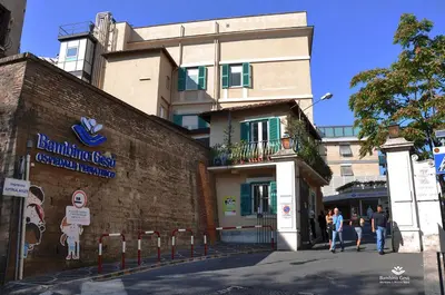 a building with people walking in front of it at Sant'Onofrio Boutique Apartment in Rome
