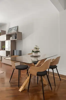 a dining room with a table and chairs at Betti Classic Home in Rome