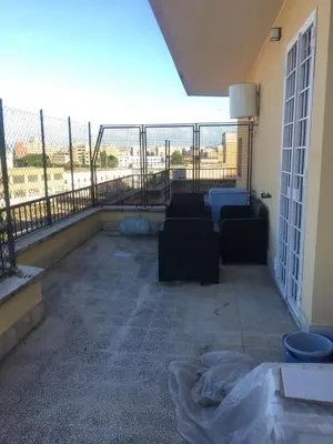 a balcony with couches and a view of a city at Francy's home sweet home in Rome
