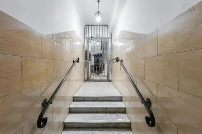 a stairway with a gate in a building at BDC - Trevi Premium 3BDR - 3BATH in Rome