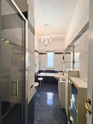 a bathroom with a sink and a toilet and a tub at La Canfora in Rome