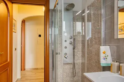 a bathroom with a shower and a sink at Pigneto84 in Rome