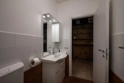 a bathroom with a shower and a toilet and a sink at Alloggio turistico di Filomena Landi in Rome