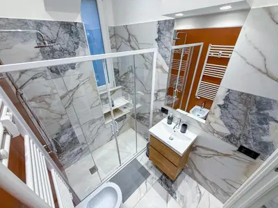 a bathroom with a shower and a sink at Feffo's home - Casa per 4 persone in Rome