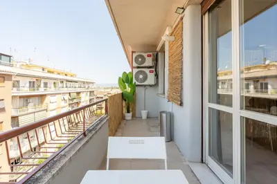 a balcony with a view of a city at Guest House Rome - Pigneto in Rome